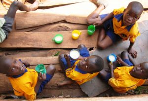 Ugandan school kids having a porridge break