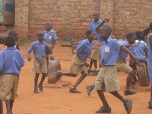 Ugandan kids playing at school