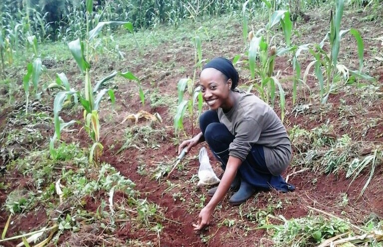 volunteer farm worker in Uganda