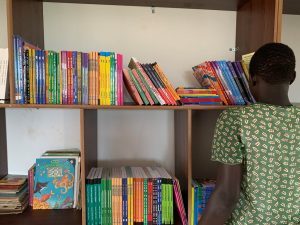 Ugandan textbooks bought new are cheaper and more appropriate than those bought or donated from abroad